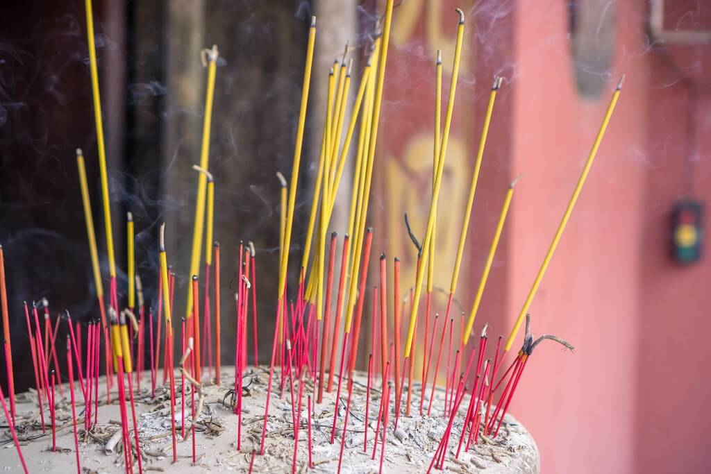 Burning Incense Sticks in a Sand filled Pot in Jade Emperor Pago